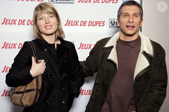 Le présentateur de télévision Nagui et Mélanie Page assistent à l'avant-première française du nouveau film de George Clooney, 'Leatherheads', au cinéma UGC Normandy à Paris, France, le 11 avril 2008. Photo by Thierry Orban/ABACAPRESS.COM