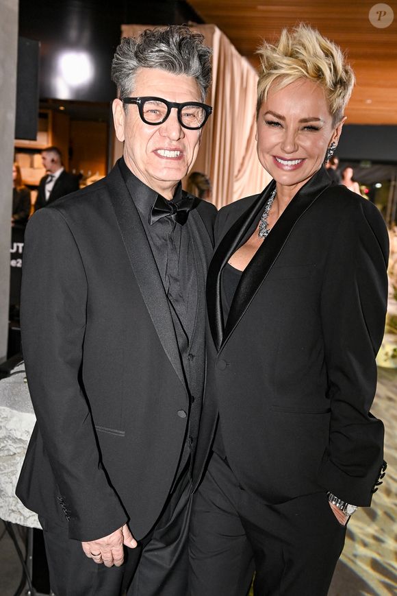 La compagne de Marc Lavoine affiche désormais un look tomboy avec une chevelure davantage rasée sur les côtés

Marc Lavoine et sa compagne Adriana Karembeu à la soirée du Beauty Ball 2026 au château de Bratislava, en Slovaquie, le 16 janvier 2026. © ProfiMedia/Bestimage