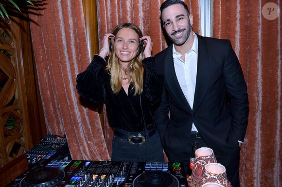 Djette Philou et Adil Rami au dîner au restaurant Dar Mima lors du concert unique de O.Harfouch et son orchestre pour la paix à l'Institut du Monde Arabe à Paris le 3 février 2024.

© Rachid Bellak / Bestimage