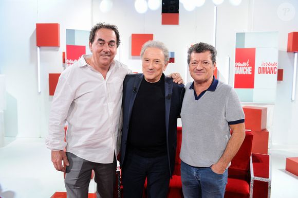 Eric Carriere, Michel Drucker et Francis Ginibre - les chevaliers du fiel lors de l'enregistrement de l'émission "Vivement dimanche" au studio Rive gauche, le 18 mars 2025. © Guillaume Gaffiot / Bestimage