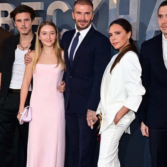 Harper Beckham,David Beckham et Victoria Beckham à l'avant-première de la série documentaire Beckham, le 3 octobre 2023. AGENCE / BESTIMAGE