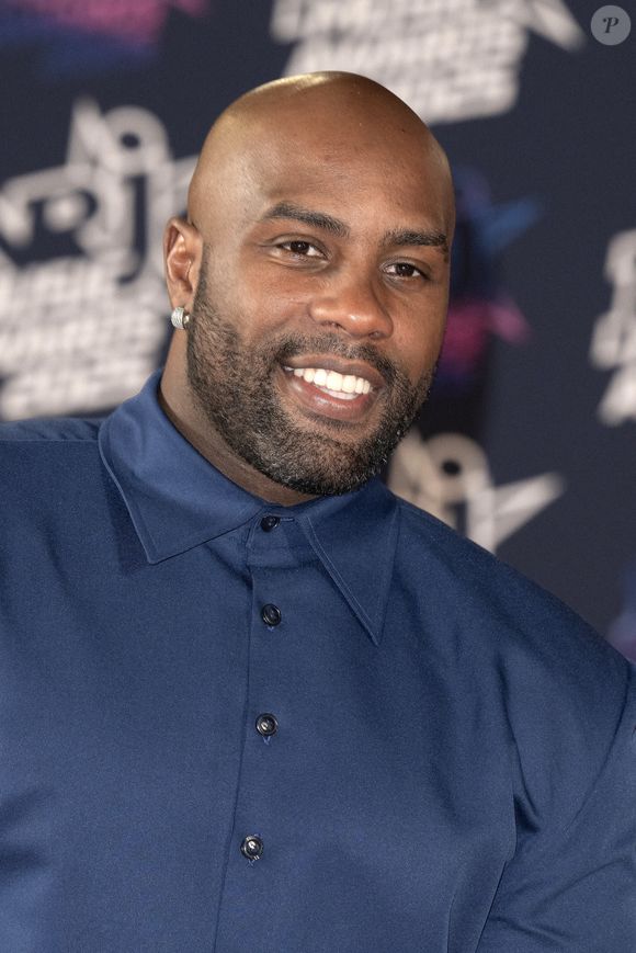Teddy Riner participe à la 27ème édition des NRJ Music Awards le 31 octobre 2025 à Cannes, France. Photo par  David NIVIERE/ABACAPRESS.COM