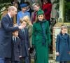 Et elle n'a pas boudé son plaisir 

Catherine (Kate) Middleton, princesse de Galles, Prince Louis, Princesse Charlotte, Prince George, Le prince William, prince de Galles - La famille royale britannique se rend à la messe de Noël à Sandringham le 25 décembre 2024.