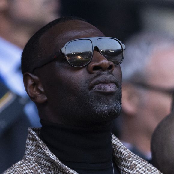 Omar Sy - Célébrités dans les tribunes lors du match retour de la Ligue Des Champions 2024-2025 (LDC) "PSG - Arsenal" (2-1) au Parc des Princes à Paris le 7 mai 2025. © Cyril Moreau/Bestimage