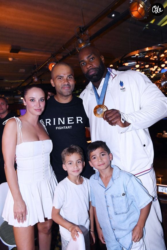 Exclusif - Tony Parker avec sa compagne Agathe Teyssier et ses enfants Josh et Liam, Teddy Riner - Teddy Riner fête son titre de champion Olympique de judo +100KG au restaurant "Podium" du groupe (Les bistrots Pas Parisiens) à Paris le 2 aout 2024. © Rachid Bellak/Bestimage