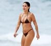 Gabriela Berlingeri est une créatrice de bijoux portoricaine à la tête de sa propre marque, Diciembre Veintinueve.

Gabriela Berlingeri aperçue à Tamarama Beach en Australie avec Bad Bunny.

© Matrix / Bestimage