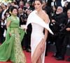 La reine de beauté porte une longue robe fendue couleur lilas avec des talons noirs à bout pointu,

Iris Mittenaere - Montée des marches du film " Fjord " lors du 79ème Festival International du Film de Cannes, le 18 mai 2026. © Jacovides-Moreau / Bestimage