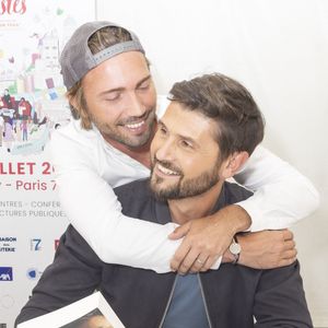 Exclusif - Ghislain Gerin et son mari Christophe Beaugrand - Festival des Livres et des Artistes organisé par l'association "Lecture pour Tous" engagée dans la lutte contre l'illettrisme au Mail Branly à Paris le2 juillet 2022. © Pierre Perusseau/ Jack Tribeca / Bestimage