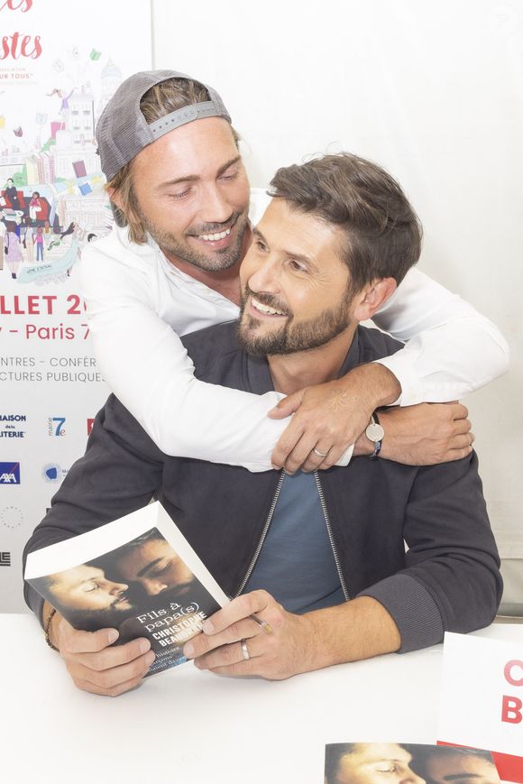 Exclusif - Ghislain Gerin et son mari Christophe Beaugrand - Festival des Livres et des Artistes organisé par l'association "Lecture pour Tous" engagée dans la lutte contre l'illettrisme au Mail Branly à Paris le2 juillet 2022. © Pierre Perusseau/ Jack Tribeca / Bestimage