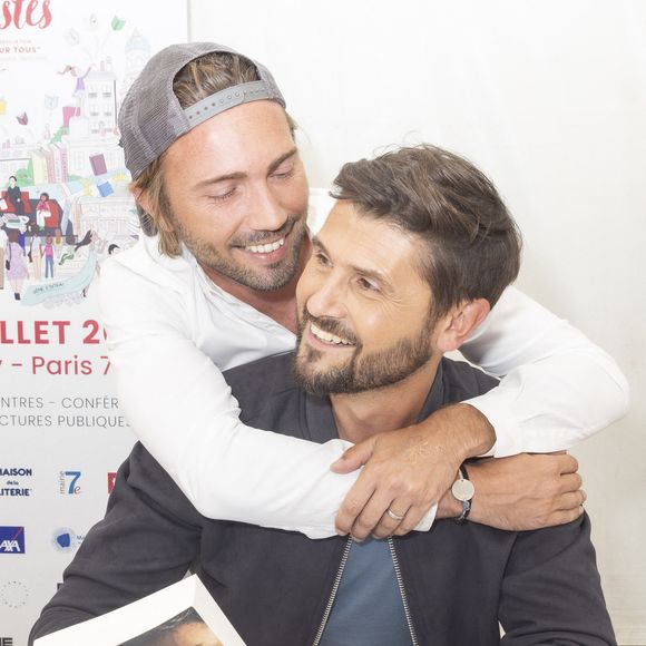 Exclusif - Ghislain Gerin et son mari Christophe Beaugrand - Festival des Livres et des Artistes organisé par l'association "Lecture pour Tous" engagée dans la lutte contre l'illettrisme au Mail Branly à Paris le2 juillet 2022. © Pierre Perusseau/ Jack Tribeca / Bestimage