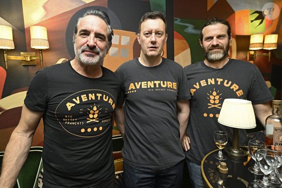 Jean Dujardin, Olvier Carsoule, Antoine Gravouil - J.Dujardin à la soirée de dégustation du whisky de seigle français "Aventure" (Bordeaux Distilling Co), dont il est partenaire, à Bruxelles, le 13 mars 2026.