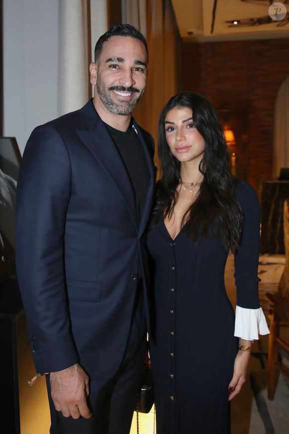 Adil Rami et sa compagne Louana Franco - Vernissage de l'exposition photos et du livre "La Boxe fait son cinéma" à l'hôtel Brach à Paris le 23 Septembre 2025. Ces clichés rendent hommage à plus de cinquante acteurs immortalisés dans des scènes où le noble art rencontre le 7ème art. © Bertrand Rindoff / Bestimage