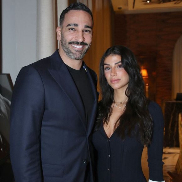 Adil Rami et sa compagne Louana Franco - Vernissage de l'exposition photos et du livre "La Boxe fait son cinéma" à l'hôtel Brach à Paris le 23 Septembre 2025. Ces clichés rendent hommage à plus de cinquante acteurs immortalisés dans des scènes où le noble art rencontre le 7ème art. © Bertrand Rindoff / Bestimage