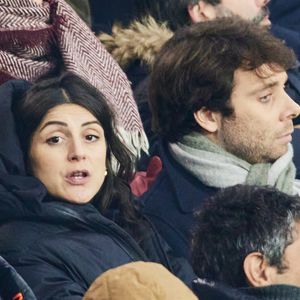 Agathe Lambret et son compagnon Benjamin Duhamel - Célébrités assistent au match de Ligue des champions entre le PSG et Manchester City (4-2) au Parc des Princes à Paris le 22 janvier 2025. © Cyril Moreau/Bestimage