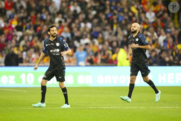 Big Flo et Oli (UNICEF) - 3ème édition de la rencontre de football caritative "Match des héros" entre le "RC Lens Légendes" et "L'équipe Unicef" au stade Bollaert-Delelis à Lens le 6 juin 2023.
Crédit : JB Autissier / Panoramic / Bestimage