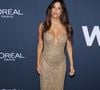 Avec ses cheveux bruns portés en boucles wavys et un maquillage lumineux aux tons naturels, la star de Desperate Housewives affichait un look sophistiqué. 

Eva Longoria - Photocall de la soirée "LOreal Lights on women's worth" lors du 79ème Festival international du Film de Cannes le 22 mai 2026.
© Denis Guignebourg / Bestimage