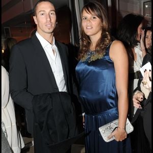 Frédérick Bousquet et Laure Manaudou (enceinte) - Dîner de gala de la mode contre la Sida au Pavillon d'Armenonville, le 28 janvier 2010. © Rachid Bellak/Bestimage
