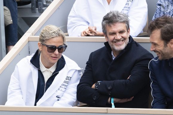 Laure Boulleau et Hervé Mathoux dans les tribunes lors des Internationaux de France de Tennis de Roland Garros 2025, à Paris, France, le 27 mai 2025. © Jacovides-Moreau/Bestimage