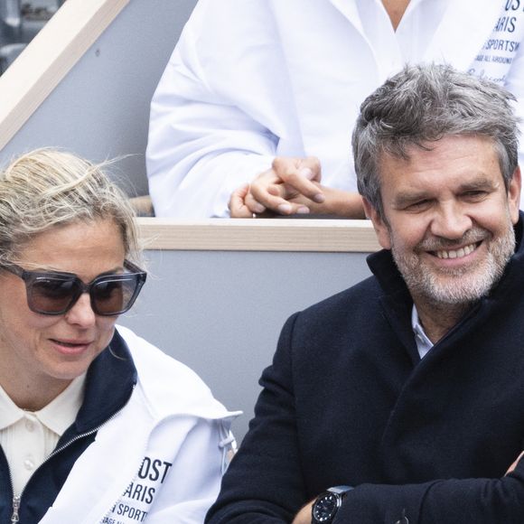 Laure Boulleau et Hervé Mathoux dans les tribunes lors des Internationaux de France de Tennis de Roland Garros 2025, à Paris, France, le 27 mai 2025. © Jacovides-Moreau/Bestimage