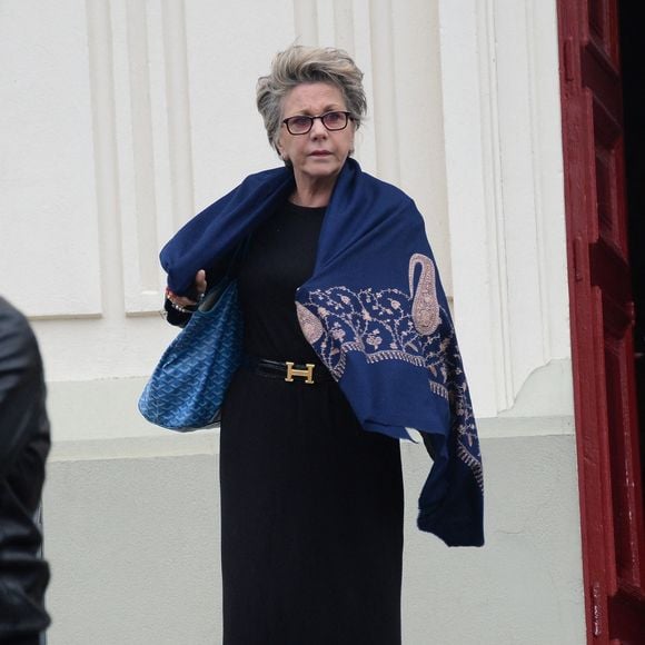 Françoise Laborde quittant l'église Jeanne d'Arc après les funérailles du journaliste Benoit Duquesne, à Versailles, France, le 10 juillet 2014. Photo by ABACAPRESS.COM