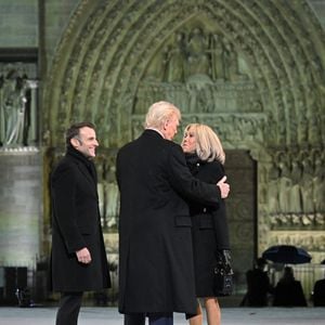 (L to R) French President, Emmanuel Macron, US President Elect, Donald Trump and Brigitte Macron attend the welcome ceremony at official reopening ceremony of Notre-Dame Cathedral in Paris, France on December 7, 2024, after more than five-years of reconstruction work following the April 2019 fire. © Eliot Blondet/Pool/Bestimage