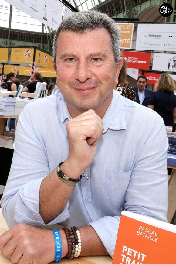 Pascal Bataille lors du Festival du Livre de Paris 2025 au Grand Palais à Paris le 12 avril 2025.

© Cédric Perrin / Bestimage