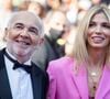 Dix ans plus tard, leur différence d'âge n'a jamais constitué un obstacle à leur histoire.

Gérard Jugnot et sa femme Patricia Campi - Montée des marches du film "Coupez !" pour la cérémonie d’ouverture du 75ème Festival International du Film de Cannes, le 17 mai 2022.

© Cyril Moreau / Bestimage