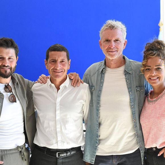 Parmi les 200 candidats en lice : un duo père-fils, un concurrent non-voyant et de nombreux athlètes prêts à tout pour atteindre la finale.

Christophe Beaugrand, David Lisnard, Denis Brogniart, Anaïs Grangerac - D.Lisnard, maire de Cannes, reçoit les animateurs de l'émission Ninja Warrior, à l'Hôtel de Ville de Cannes, le 31 mars 2025. 
© Lionel Urman / Bestimage