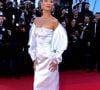 Le mannequin portait une élégante robe blanche Prada.

Bella Hadid - Montée des marches du film " Garance " lors du 79ème Festival International du Film de Cannes, le 17 mai 2026. © Olivier Borde / Bestimage