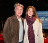 "J'avais une photo de moi dans un sauna, avec la tête très rouge, bien ridicule et je lui ai dit" a-t-il confié.

François Cluzet et sa femme Narjiss Falcoz lors de l'avant-première du film "Les Chemins Noirs" à Nice, le 26 janvier 2023. © Bruno Bebert / Bestimage