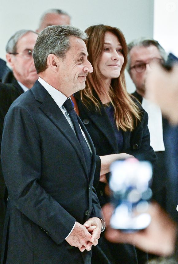 Nicolas Sarkozy et sa femme Carla Bruni - Nicolas Sarkozy condamné à 5 ans de prison à l'issue du procès de l'affaire du financement libyen au tribunal correctionnel de Paris, le 25 septembre 2025. L'ancien chef de l'Etat était accompagné de sa femme, C.Bruni. Nicolas Sarkozy, jugé coupable d’association de malfaiteurs, sera prochainement convoqué en vue de lui signifier la date de son incarcération. 
© Christian Liewig / Bestimage