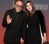 elle dit toujours croire en l'amour, même si cela peut paraître un peu fou.

Tim Burton et Monica Bellucci au photocall de la cérémonie d'ouverture et à la projection du film "L'Ordre" lors du 21ème Festival international du film de Marrakech, le 29 novembre 2024j à Marrakech, Maroc. © Dominique Jacovides/Bestimage