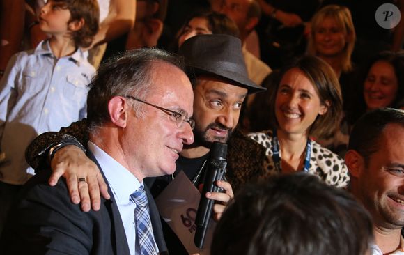 Cyril Hanouna, présentateur de la soirée, le président du Crédit Mutuel et Alexia Laroche-Joubert - Concert des 60 ans d'Europe 1 au Zénith à Paris. Le 21 mai 2015. © Denis Guignebourg / Bestimage