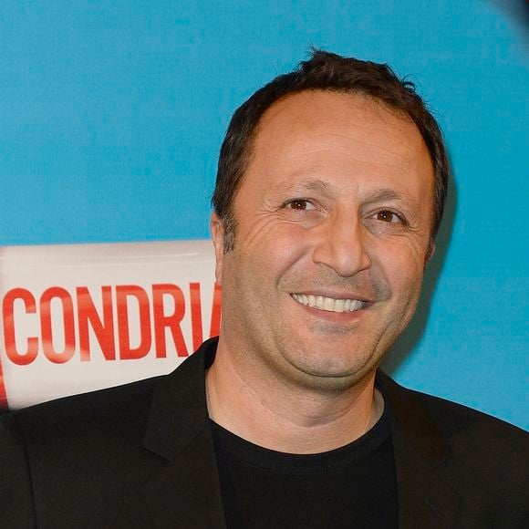 Selon Paris Match, le premier à avoir été convaincu par cette drôle d'histoire n'est pas un habitué des salles obscures : il s'agit de l'animateur de télévision Arthur, qui a financé le développement du premier film. 
Arthur à l'avant-première du film "Supercondriaque" au Gaumont Opéra à Paris, le 24 février 2014.