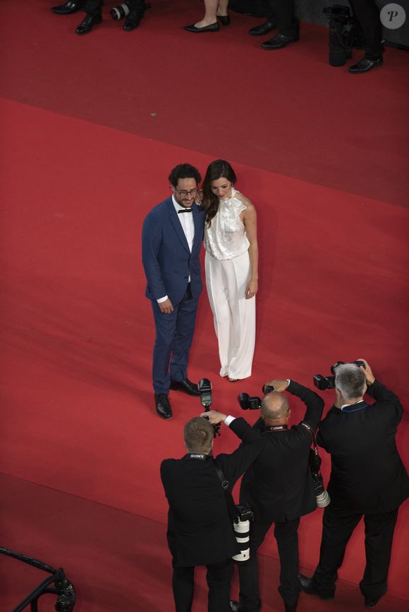 Thomas Hollande, sa femme Emilie Broussouloux - Montée des marches du film "R.M.N." lors du 75ème Festival International du Film de Cannes, le 21 mai 2022.
© Pool/ Bestimage