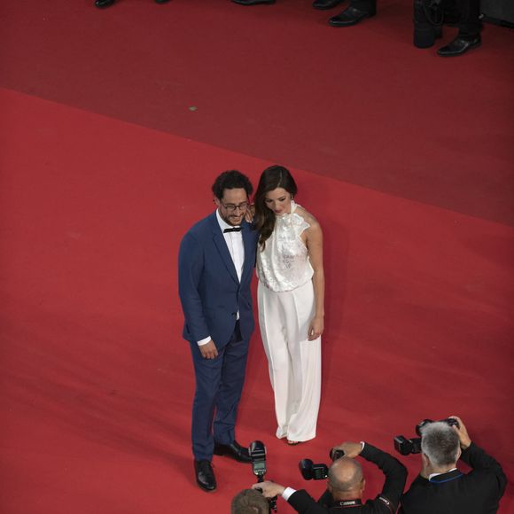 Thomas Hollande, sa femme Emilie Broussouloux - Montée des marches du film "R.M.N." lors du 75ème Festival International du Film de Cannes, le 21 mai 2022.
© Pool/ Bestimage