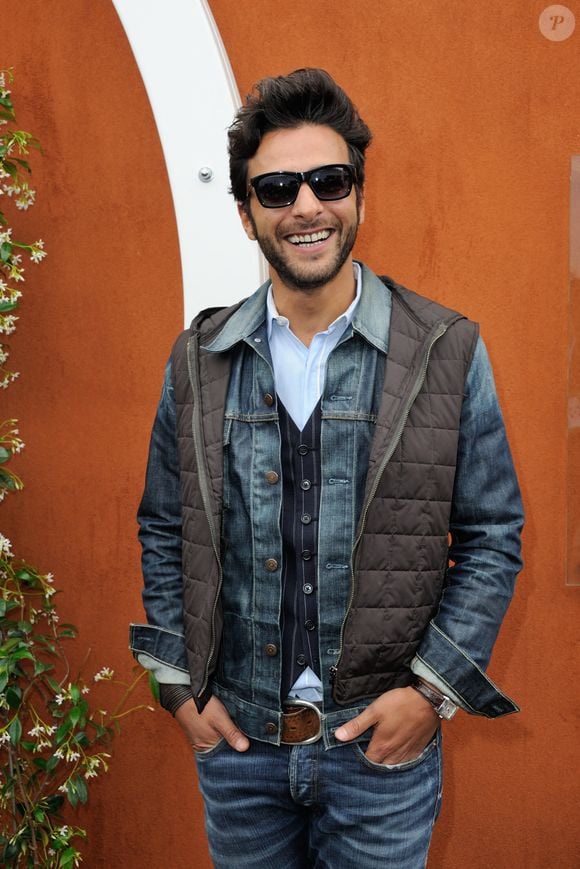 Maxime Nucci pose au Village pendant les Internationaux de France de Tennis à Roland-Garros à Paris, France, le 24 mai 2016. Photo par Alban Wyters/ABACAPRESS.COM