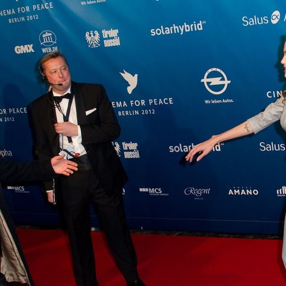 Brad Pitt et Angelina Jolie a la soiree de Gala: Cinema for Peace 2012, a Berlin AGENCE / BESTIMAGE