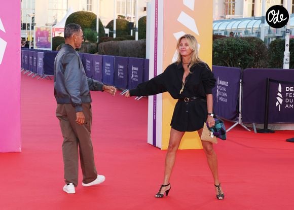 Elle venait soutenir son compagnon Roschdy Zem, président et membre du jury

Roschdy Zem et sa compagne Sarah Poniatowski sur le tapis rouge lors de la première du film 'L'Invitation' pendant la 52ème édition du Festival du Cinéma Américain de Deauville, France, le 5 septembre 2026. © Denis Guignebourg/Bestimage