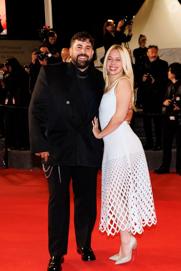 Artus et sa compagne Kim Higelin - Montée des marches du film "Jim Queen" lors du 79ème Festival International du Film de Cannes le 18 mai 2026.

© Moreau / Jacovides / Bestimage