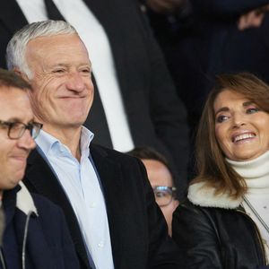 Didier Deschamps et sa femme Claude - Célébrités dans les tribunes lors du quart de finale aller de Ligue des champions: Le PSG s'est incliné à domicile face au FC Barcelone (2-3) au Parc des Princes à Paris le 10 avril 2024. © Cyril Moreau/Bestimage