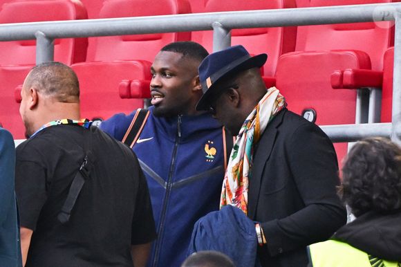 Marcus THURAM (France) et son père Lilian THURAM lors du match des huitièmes de finale de l'UEFA Euro 2024 entre la France et la Belgique à l'Esprit Arena le 1er juillet 2024 à Düsseldorf, en Allemagne. Photo by Anthony Dibon/Icon Sport/ABACAPRESS.COM