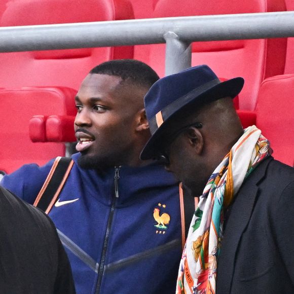 Marcus THURAM (France) et son père Lilian THURAM lors du match des huitièmes de finale de l'UEFA Euro 2024 entre la France et la Belgique à l'Esprit Arena le 1er juillet 2024 à Düsseldorf, en Allemagne. Photo by Anthony Dibon/Icon Sport/ABACAPRESS.COM