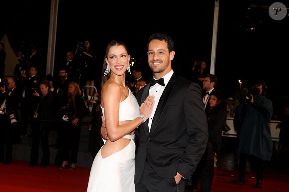 Iris Mittenaere et son fiancé Diego El Glaoui - Montée des marches du film " Le retour (Homecoming) " lors du 76ème Festival International du Film de Cannes, au Palais des Festivals à Cannes. Le 17 mai 2023
© Jacovides-Moreau / Bestimage
