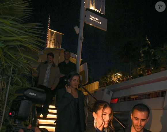 Antoine Dupont et l'ex Miss France Iris Mittenaere au photocall du Grand Dîner en toute intimité avec Dadju sur la plage de l'hôtel Carlton en marge du 78ème Festival International du Film de Cannes, France, le 17 mai 2025. © Lionel Urman/Bestimage