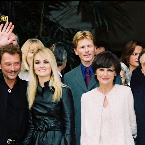 Laeticia et Johnny Hallyday assistent au mariage de Michel Sardou et Anne-Marie Perrier en 1999 - ©Agence - Bestimage