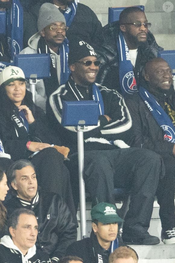 Le rappeur SDM - Célébrités dans les tribunes du match de 8ème de finale aller de la Ligue Des Champions 2025-2026 (LDC) "PSG - Chelsea (5-2)" au Parc des Princes à Paris le 11 mars 2026. © Cyril Moreau/Bestimage