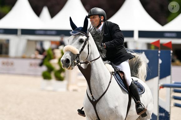 Serge Varsano sur Just Dance T&L Z dans l'épreuve Prix Barnes lors de la 10ème édition du "Longines Paris Eiffel Jumping" à la Plaine de Jeux de Bagatelle à Paris le 22 juin 2024.

© Pierre Perusseau / Veeren / Bestimage