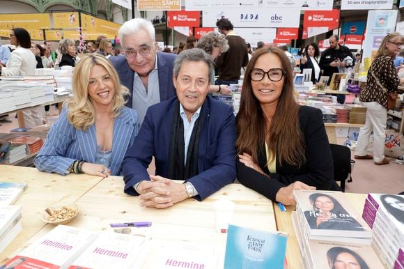 Georges Fenech avec sa compagne Marie Severine Trouban,  Nathalie Marquay Pernaut et Guy Tredaniel - Festival du Livre de Paris 2025 au Grand Palais à Paris le 12 avril 2025.
© Cédric Perrin / Bestimage