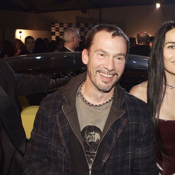 La créatrice française Chantal Thomass, le chanteur Florent Pagny et sa femme Azucena assistent au Festival de l'automobile au Grand Palais à Paris, France, le 17 janvier 2006. Photo par Laurent Zabulon/ABACAPRESS.COM.